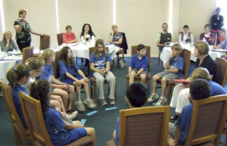 West Beach Public School pupils and teacher Rosemary Griffin participate in SW Metro District’s Restorative Directions Day, engaging in a circle process.