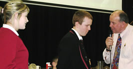 Terry O'Connell talks with students
