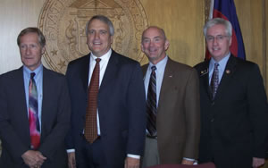 (L-R) Colorado youth RJ bill author Pete Lee, Governor Bill Ritter, Representative Michael Merrifield and Senator John Morse, at the bill-signing ceremony