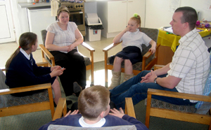 Students at St. James Primary School participate in a restorative circle facilitated by Mark Finnis, restorative justice development officer at the Sefton Centre for Restorative Practice.