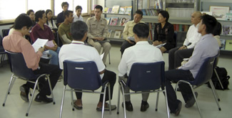 A family and community group conference (FCGC) in Thailand.