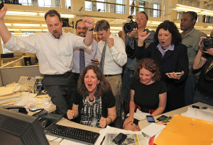 Inquirer staff celebrate their Pulitzer Prize for public service. (MICHAEL BRYANT / Inquirer Staff Photographer)